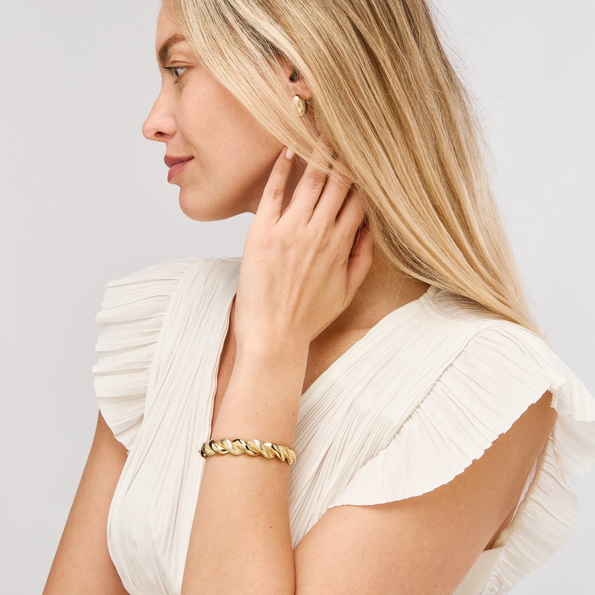 Birmingham Jewelry - 14K Yellow Gold Textured and Polished Twist Bangle Bracelet - Birmingham Jewelry